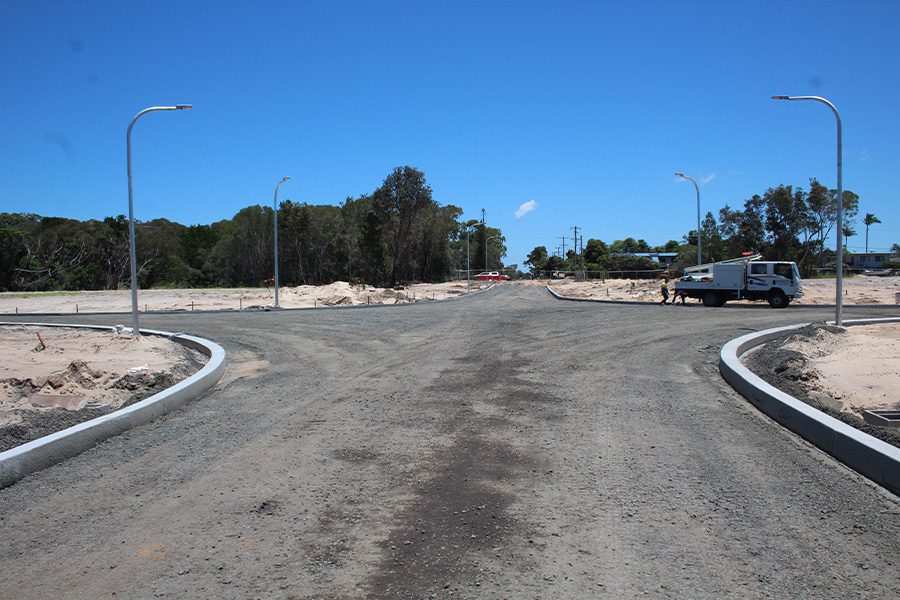 211215 Stage 1 Concrete Edge Restraint Kerb constructed - Laurie Dr looking south towards future roundabout